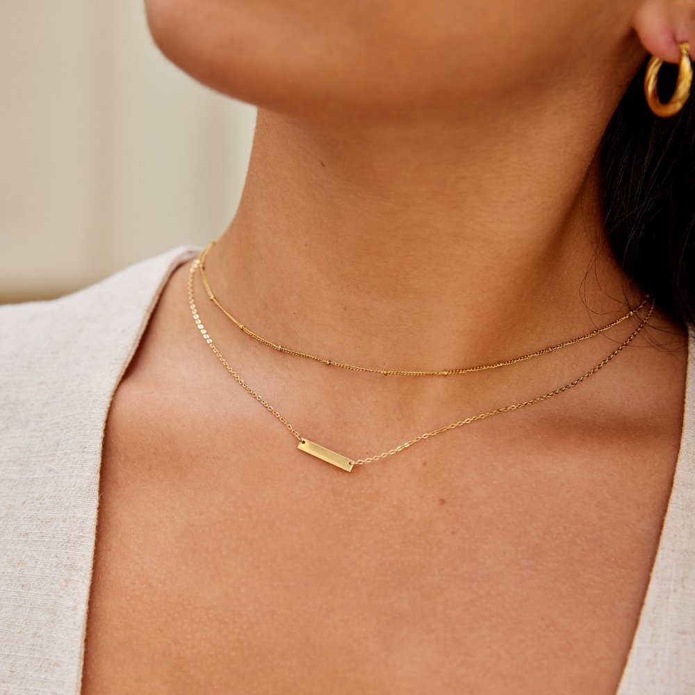 Collar de barra de oro Rina