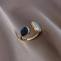 Anillo abierto ajustable con doble gema