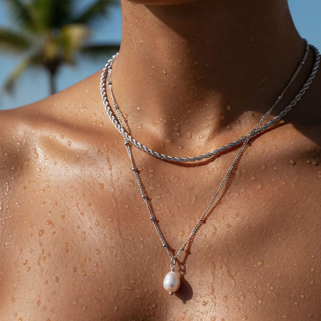 Collar con dije de perla y cadena de cuerda