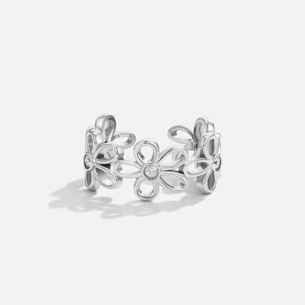 Anillo Infinito de Plata con Flor Silvestre